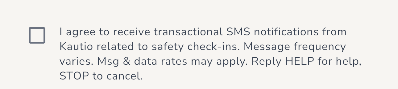 Close-up of the SMS consent checkbox reading: I agree to receive transactional SMS notifications from Kautio related to safety check-ins. Message frequency varies. Msg and data rates may apply. Reply HELP for help, STOP to cancel.